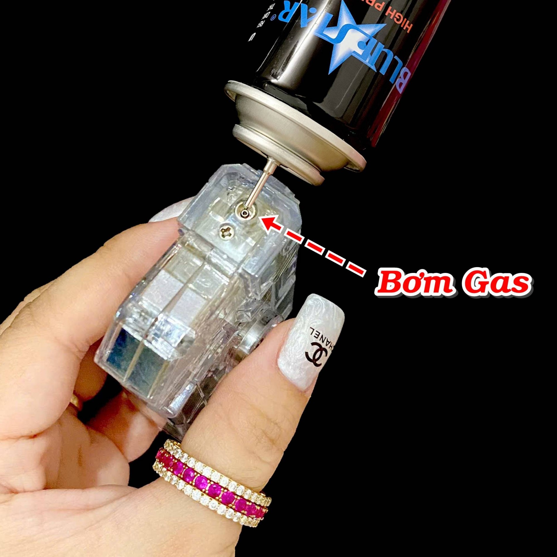 Bật lửa hình súng cà rốt trong suốt có con quay (có đèn nhấp nháy- xài gas)